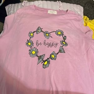 An Urban Nation, pink shirt that’s has a front and back print, Kids XL size 16